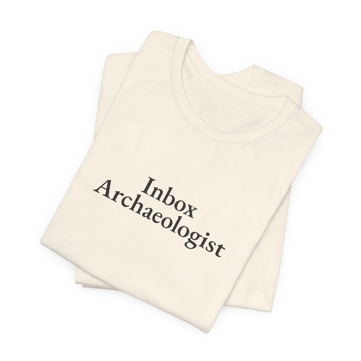 Natural “Inbox Archaeologist” tee, folded