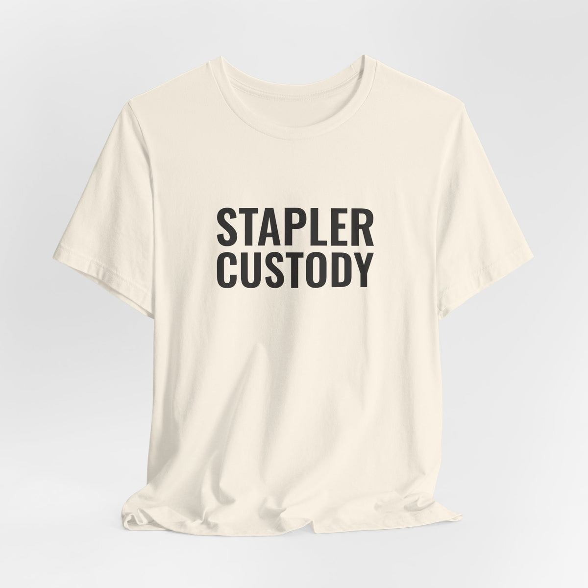 Hanging natural “Stapler Custody” tee, front print