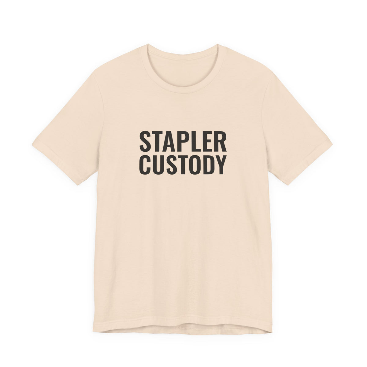Soft cream tee printed with “Stapler Custody”, front view