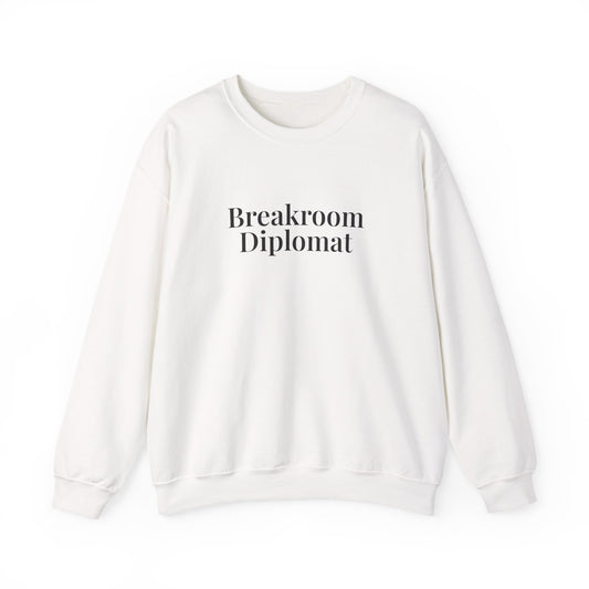White crewneck sweatshirt printed with “Breakroom Diplomat”, front view