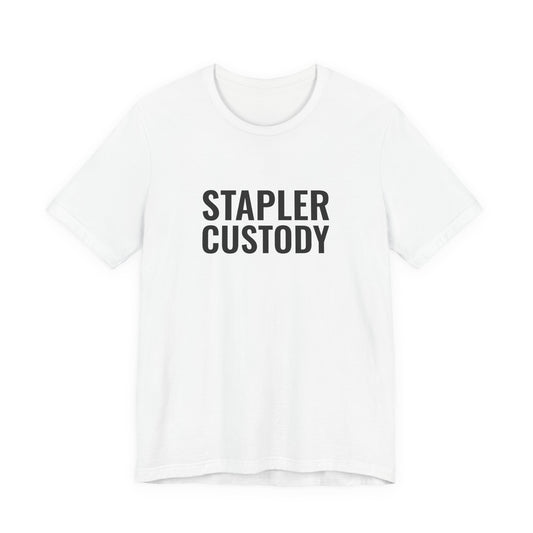 White “Stapler Custody” tee, shown from the front