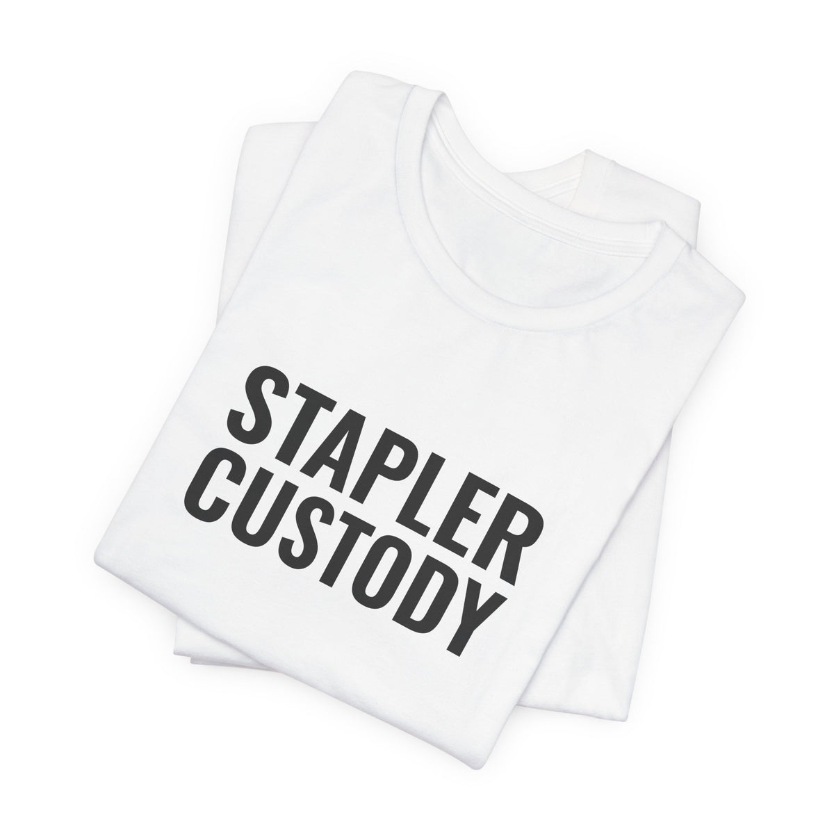 The white “Stapler Custody” tee folded flat