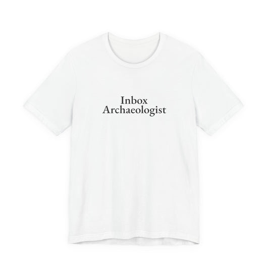 Front of the white “Inbox Archaeologist” tee