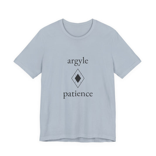 Light blue “Argyle Patience” golf tee, front view with the large chest print